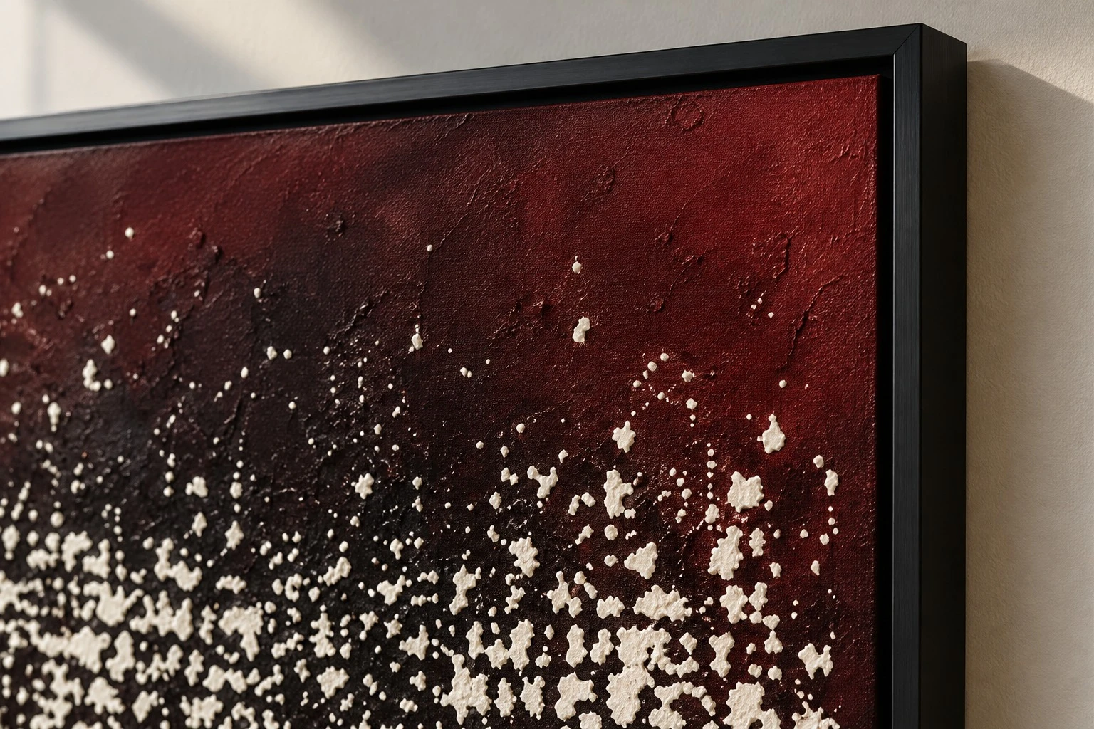 Framed maroon black speckle art corner and texture detail