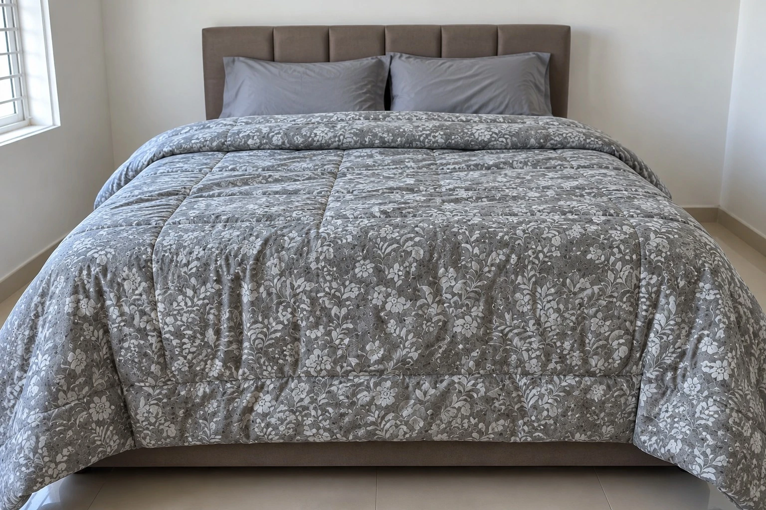 Platinum grey floral jacquard comforter foot of bed