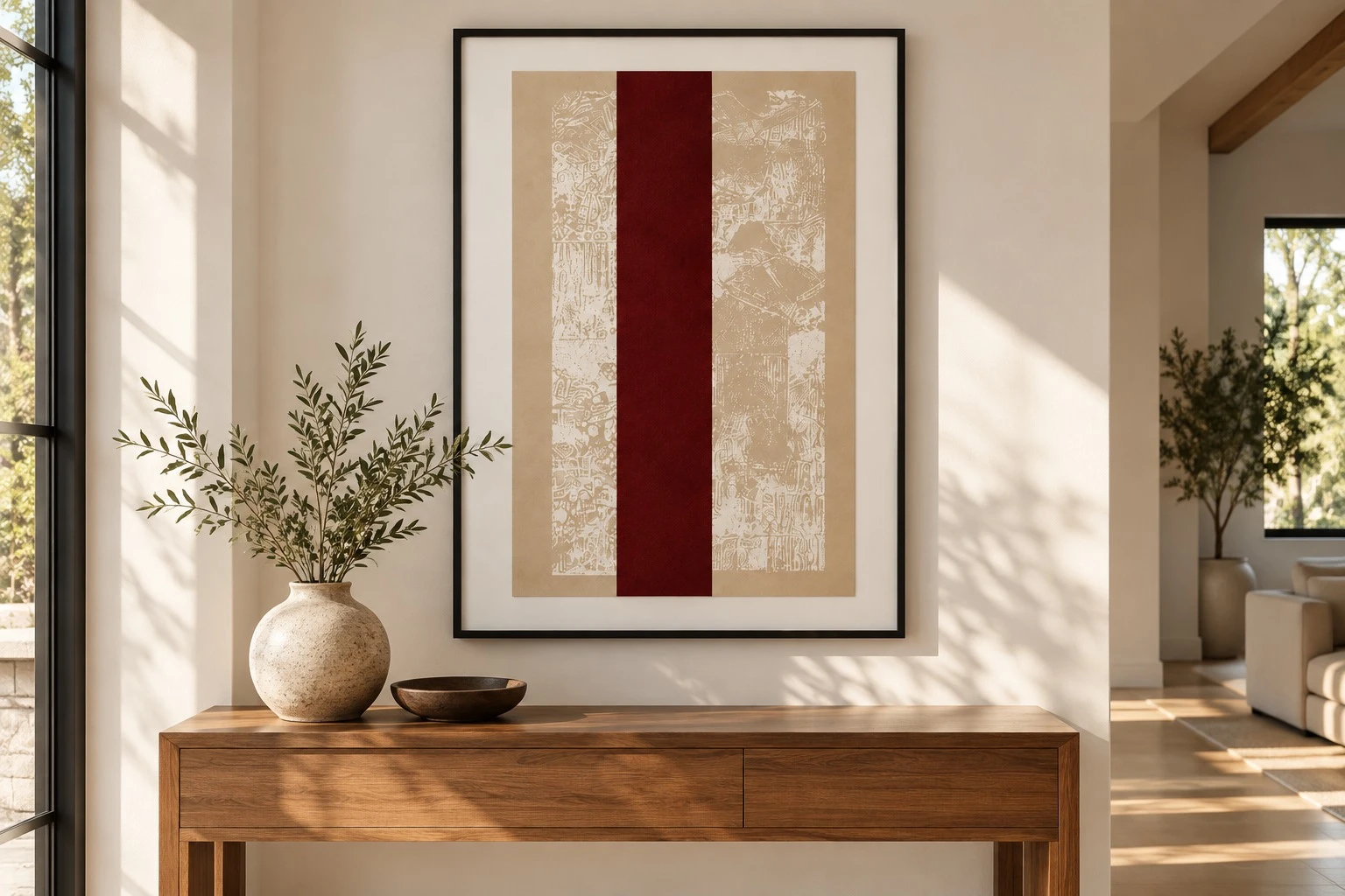 Framed maroon beige panel abstract art above wooden console